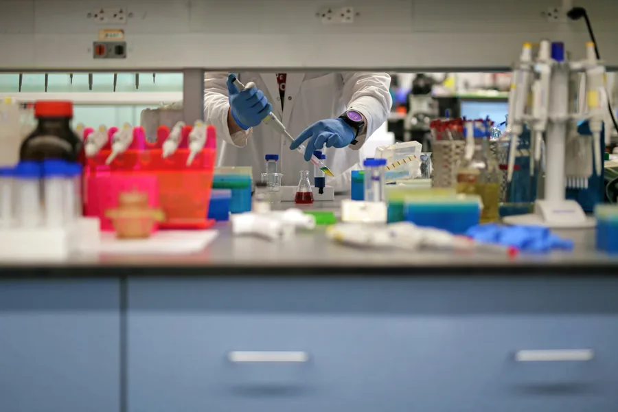 Scientist carrying out precision laboratory testing